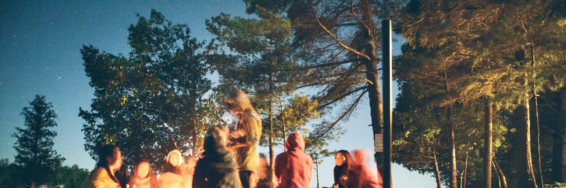 People gathered around a campfire